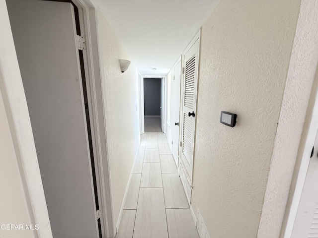 8429 Lasso Cir, El Paso, TX 79907 - hallway with a textured wall