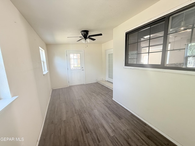 8429 Lasso Cir, El Paso, TX 79907 - spare room featuring wood finished floors and a ceiling fan