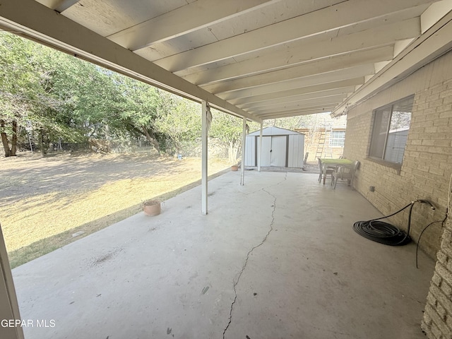 8429 Lasso Cir, El Paso, TX 79907 - view of patio / terrace featuring a storage unit