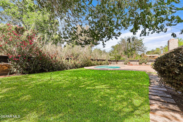 745 Rinconada Ln, El Paso, TX 79932 - fenced backyard featuring a patio area