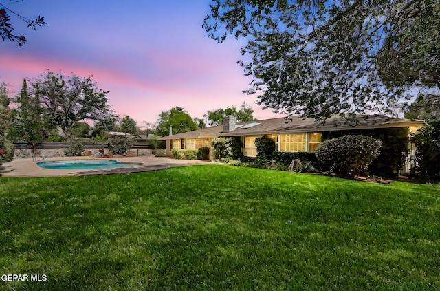 745 Rinconada Ln, El Paso, TX 79932 - view of green lawn featuring a patio and an outdoor pool
