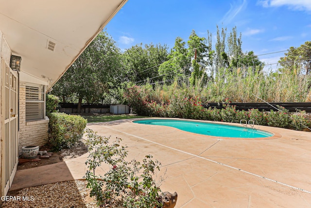 745 Rinconada Ln, El Paso, TX 79932 - view of pool featuring a patio, a shed, and a fenced backyard