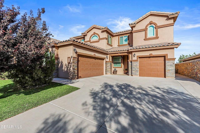 448 White Cloud Rd, El Paso, TX 79928 - mediterranean / spanish home featuring stone siding, stucco siding, driveway, and a garage