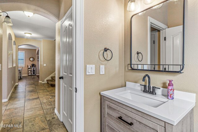 448 White Cloud Rd, El Paso, TX 79928 - bathroom with vanity and a textured wall