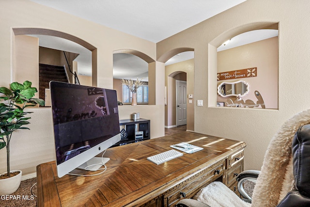 448 White Cloud Rd, El Paso, TX 79928 - home office featuring arched walkways and baseboards