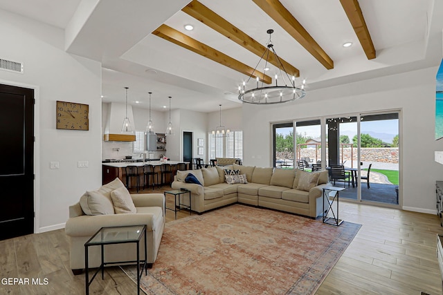 6328 Camino Nogal Dr, El Paso, TX 79932 - living room with a chandelier, light wood-style floors, beam ceiling, and recessed lighting