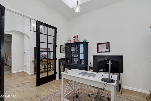 6328 Camino Nogal Dr, El Paso, TX 79932 - office space with arched walkways and light wood finished floors