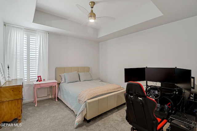 6328 Camino Nogal Dr, El Paso, TX 79932 - carpeted bedroom with a raised ceiling, an office area, and a ceiling fan