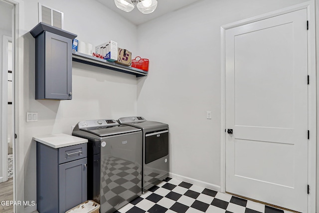 6328 Camino Nogal Dr, El Paso, TX 79932 - laundry area with washer and clothes dryer, light flooring, and cabinet space