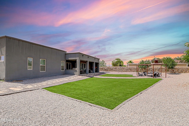 6328 Camino Nogal Dr, El Paso, TX 79932 - back of property featuring a patio area and a lawn