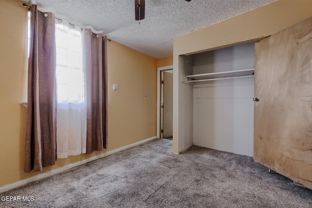 301 Cooley Ave, El Paso, TX 79907 - unfurnished bedroom with carpet, a closet, ceiling fan, and a textured ceiling