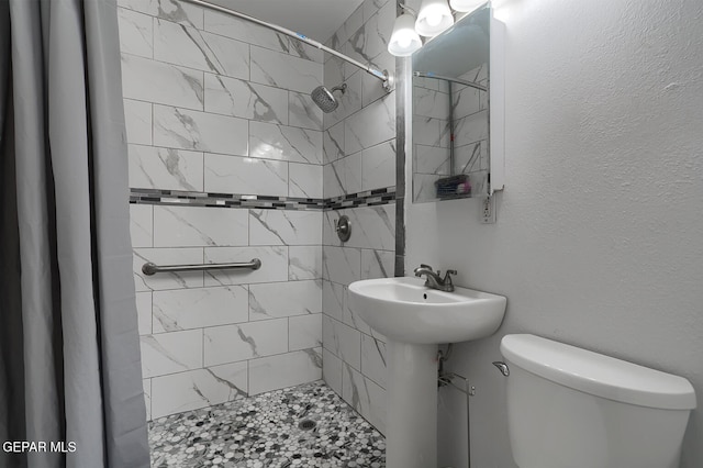 301 Cooley Ave, El Paso, TX 79907 - full bathroom with toilet and a stall shower
