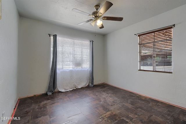 301 Cooley Ave, El Paso, TX 79907 - spare room featuring ceiling fan and baseboards