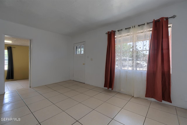 301 Cooley Ave, El Paso, TX 79907 - unfurnished room featuring light tile patterned floors