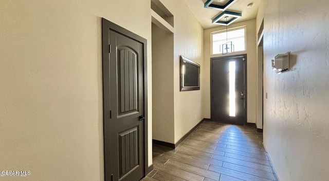 12301 Desert Pine Ave, El Paso, TX 79938 - doorway to outside with baseboards and wood finished floors