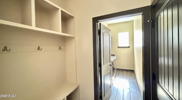 12301 Desert Pine Ave, El Paso, TX 79938 - mudroom with baseboards and wood finished floors
