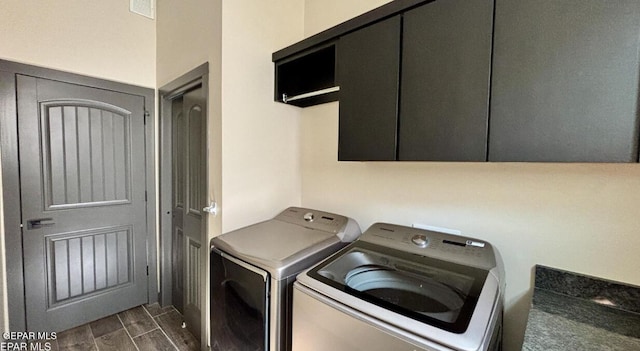 12301 Desert Pine Ave, El Paso, TX 79938 - washroom with washer and dryer, cabinet space, and wood tiled floors