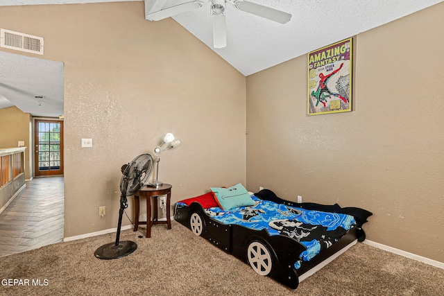 4728 Loma Grande Dr, El Paso, TX 79934 - bedroom featuring lofted ceiling, carpet, a ceiling fan, a textured ceiling, and a textured wall