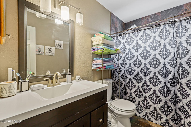 4728 Loma Grande Dr, El Paso, TX 79934 - full bath featuring a textured wall, vanity, and a shower with curtain