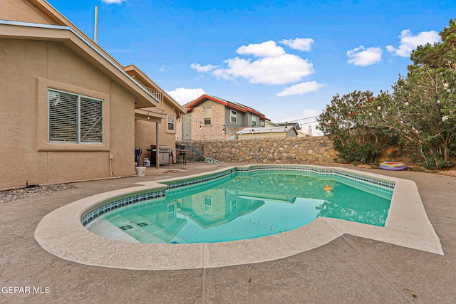 4728 Loma Grande Dr, El Paso, TX 79934 - view of pool featuring a fenced backyard, a patio, and area for grilling