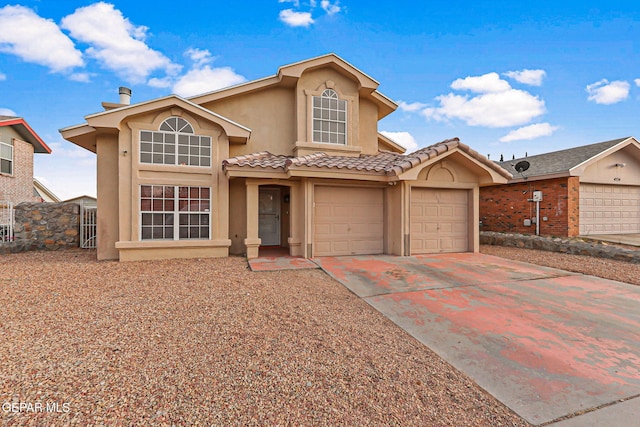 4728 Loma Grande Dr, El Paso, TX 79934 - view of front facade featuring stucco siding, driveway, and a tiled roof