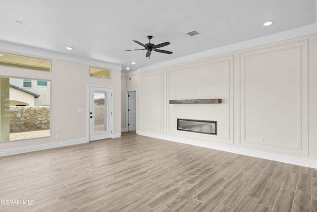 13375 Jeff Winton Dr, El Paso, TX 79928 - unfurnished living room featuring light wood-style floors, a ceiling fan, and recessed lighting