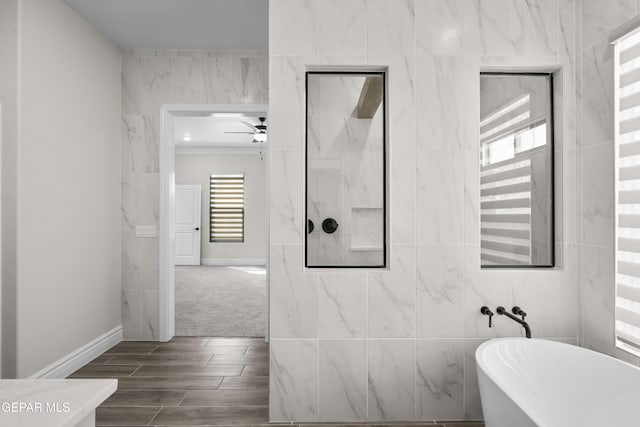 13375 Jeff Winton Dr, El Paso, TX 79928 - bathroom with a freestanding tub, ceiling fan, and wood finish floors