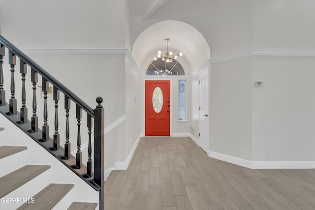 4321 Loma Casitas Rd, El Paso, TX 79934 - entrance foyer featuring a chandelier, wood finished floors, and stairs