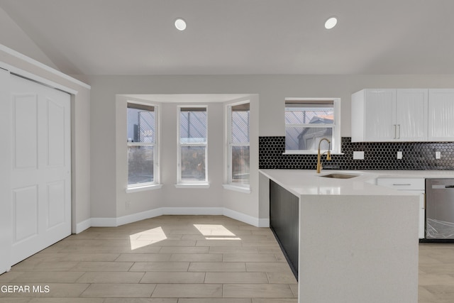 4321 Loma Casitas Rd, El Paso, TX 79934 - kitchen with dishwasher, white cabinetry, tasteful backsplash, light countertops, and recessed lighting
