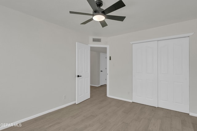 4321 Loma Casitas Rd, El Paso, TX 79934 - unfurnished bedroom with light wood finished floors, a closet, and a ceiling fan