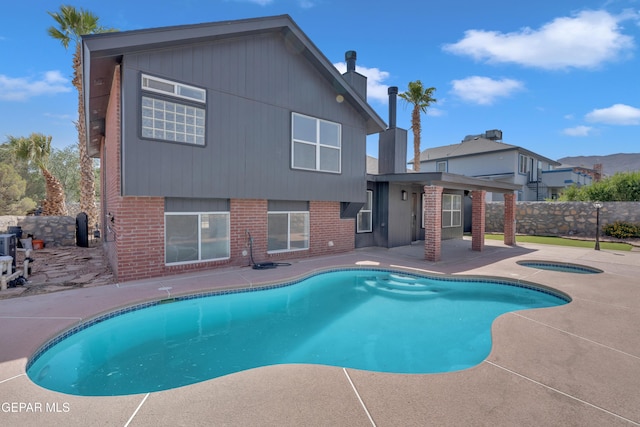 4321 Loma Casitas Rd, El Paso, TX 79934 - view of swimming pool featuring an in-ground hot tub and a patio area