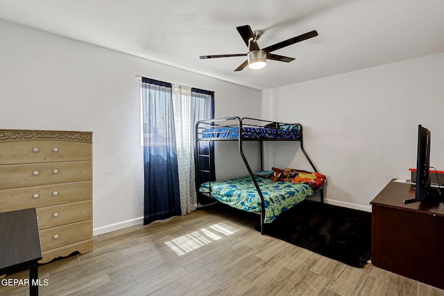 9128 Diana Dr, El Paso, TX 79924 - bedroom with wood finished floors and ceiling fan