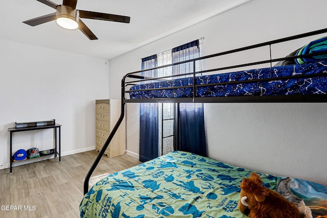 9128 Diana Dr, El Paso, TX 79924 - bedroom with wood finished floors and ceiling fan