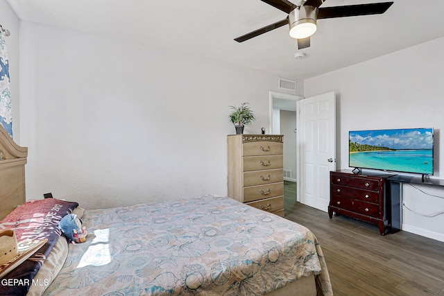 9128 Diana Dr, El Paso, TX 79924 - bedroom with dark wood-style floors and ceiling fan