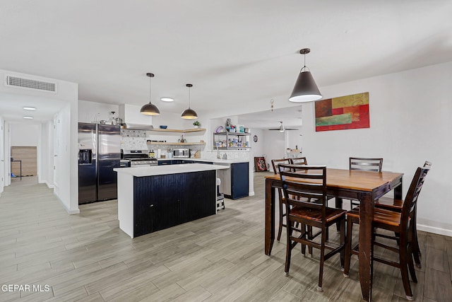 9128 Diana Dr, El Paso, TX 79924 - dining space with light wood finished floors and a ceiling fan