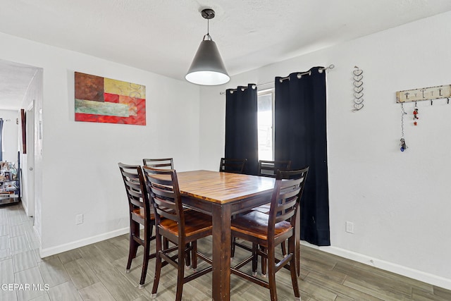 9128 Diana Dr, El Paso, TX 79924 - dining room with wood finish floors and baseboards
