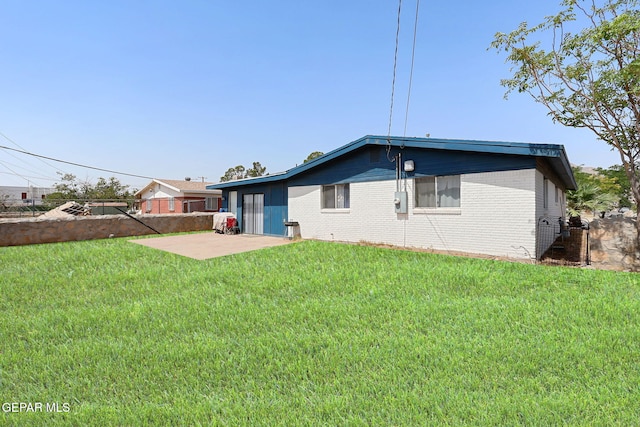 9128 Diana Dr, El Paso, TX 79924 - back of house with brick siding and a patio
