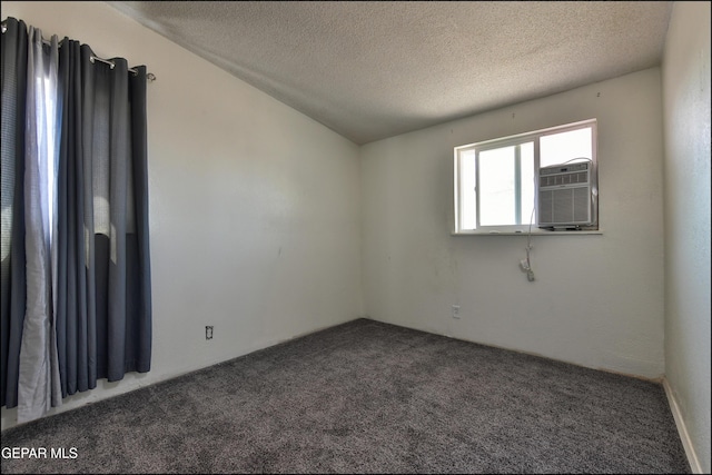 5726 Dearborne Dr, El Paso, TX 79924 - spare room with dark carpet and a textured ceiling