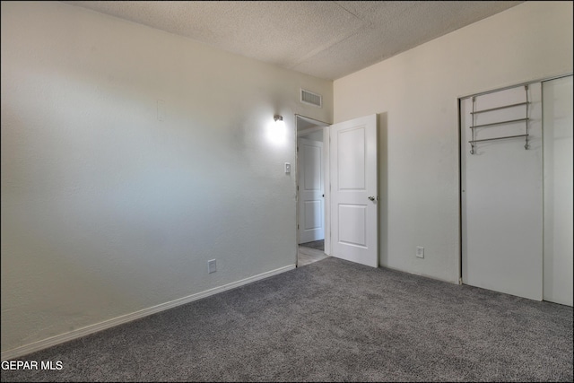 5726 Dearborne Dr, El Paso, TX 79924 - unfurnished bedroom featuring carpet floors, a textured ceiling, and a closet