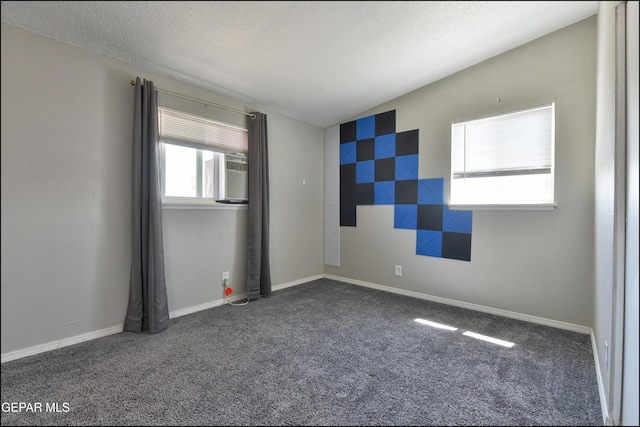 5726 Dearborne Dr, El Paso, TX 79924 - spare room with carpet floors, cooling unit, and a textured ceiling