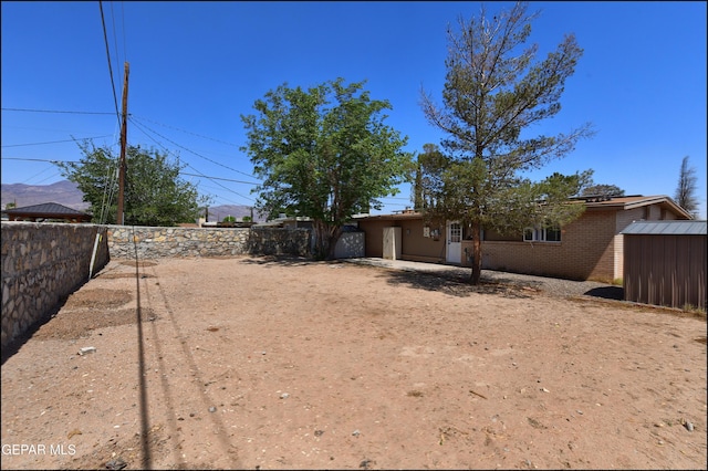 5726 Dearborne Dr, El Paso, TX 79924 - fenced backyard featuring a storage shed