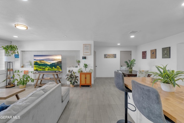 8142 Cook Dr, El Paso, TX 79907 - living room featuring recessed lighting and light wood-style floors