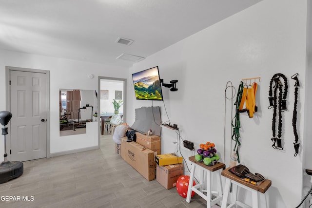 8142 Cook Dr, El Paso, TX 79907 - interior space featuring light wood-type flooring and attic access