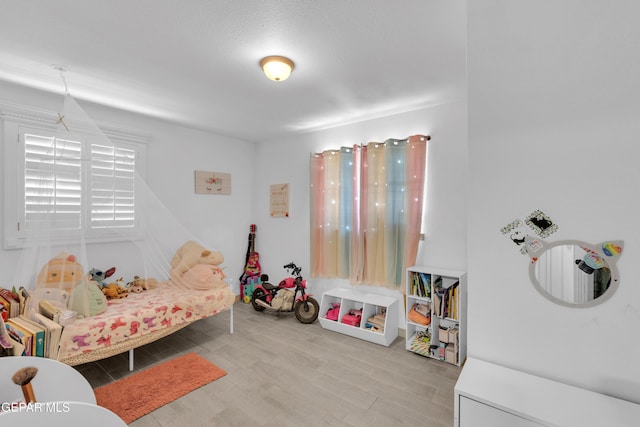 8142 Cook Dr, El Paso, TX 79907 - bedroom featuring wood finished floors