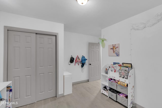 8142 Cook Dr, El Paso, TX 79907 - recreation room with light wood-style floors