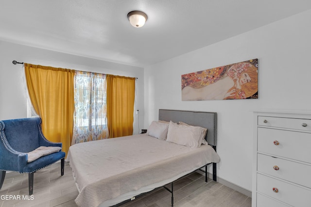 8142 Cook Dr, El Paso, TX 79907 - bedroom featuring light wood-style flooring