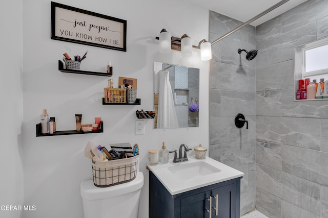8142 Cook Dr, El Paso, TX 79907 - bathroom featuring vanity and a tile shower