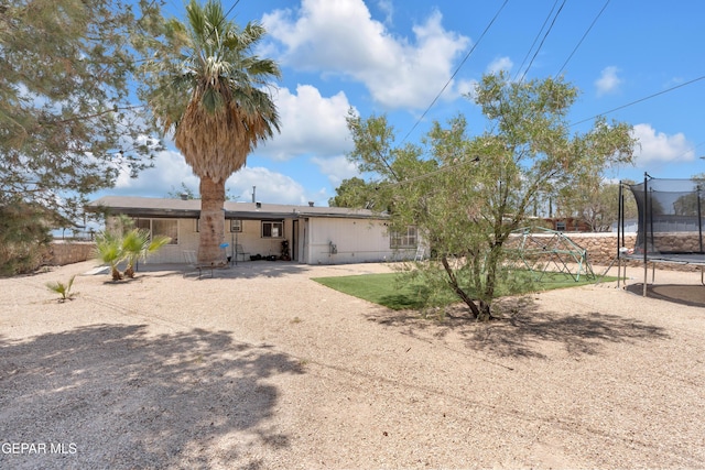 8142 Cook Dr, El Paso, TX 79907 - view of front of home featuring a trampoline