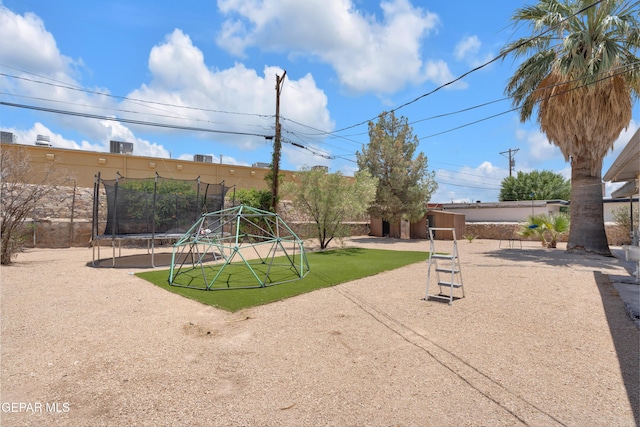8142 Cook Dr, El Paso, TX 79907 - view of play area with a trampoline