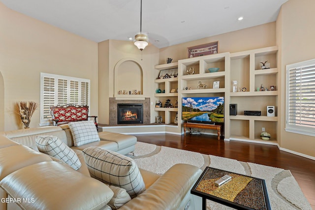 6310 Franklin Crest Dr, El Paso, TX 79912 - living area featuring dark wood-style flooring, a fireplace, built in shelves, and recessed lighting